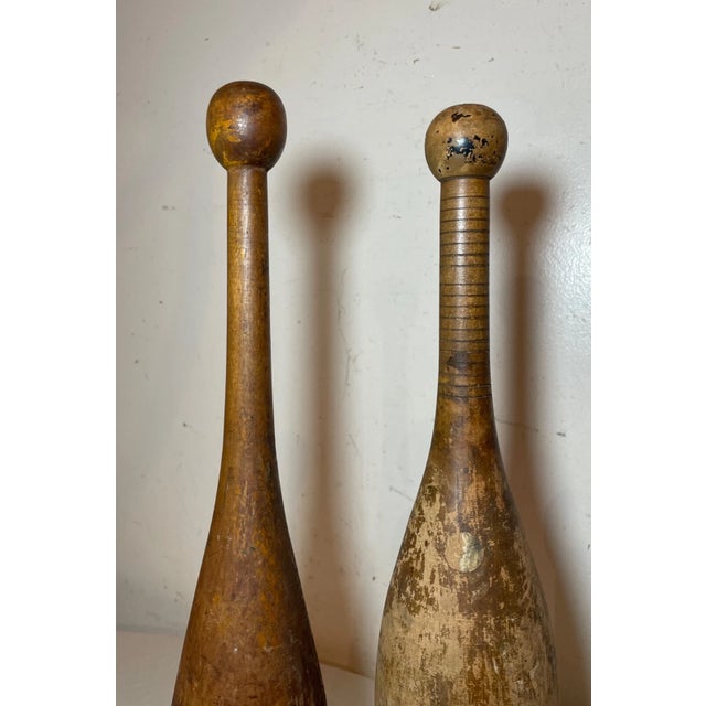Up for sale is a wonderful pair of antique 19th century handmade wooden exercise pins. They're made into lovely silhouette...