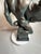 This heavy piece of sculpture which is made from industrial plaster sets a scene of two young lovers absorbed in the...