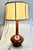 Iconic Currey & Co retired Oxblood Chameleon Table Lamps with original Gold Boned Silk Bell Shades; un-lacquered brass...