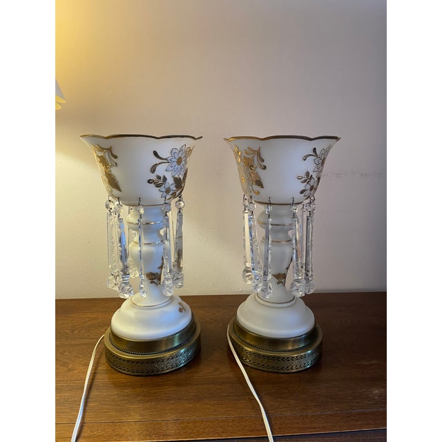 These items are antique Bohemian white milk glass mantel lusters. They feature hand-painted gold floral decorations and...