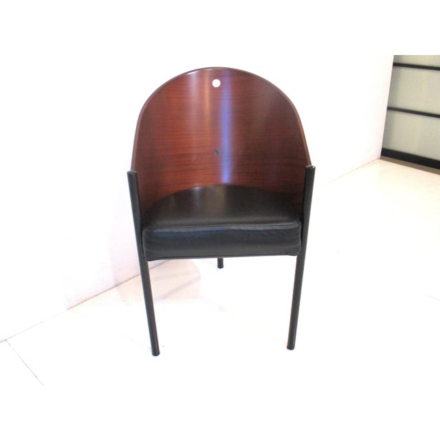 A well crafted Costes arm chair by the iconic French designer Philippe Starck using bent wood , satin black steel tri pod...