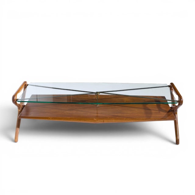 Cesare Lacca Style Mid Century Italian Walnut and Brass Coffee Table This coffee table measures: 58 wide x 23 deep x 17...