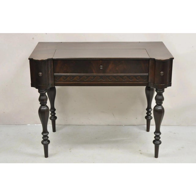 Antique Victorian Mahogany Spinet Piano Style Flip Top Secretary Writing Desk. Item features 3 drawers, pull out writing...