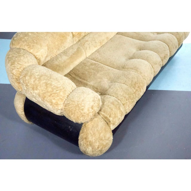 A rare three-seater sofa designed by Adriano Piazzesi, produced in Italy during the 1970s. Upholstered in its original...