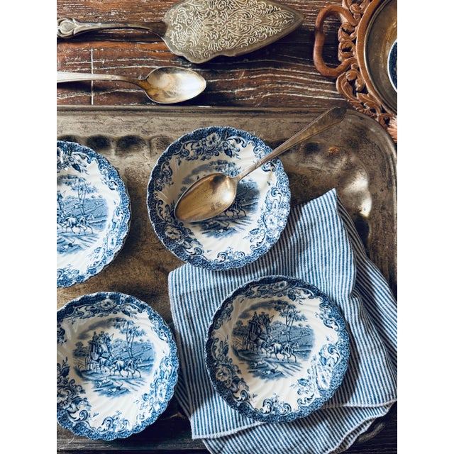 Charming set of four vintage Johnson Brothers Coaching Scenes Blue ironstone bowls, made in England. Each features the...