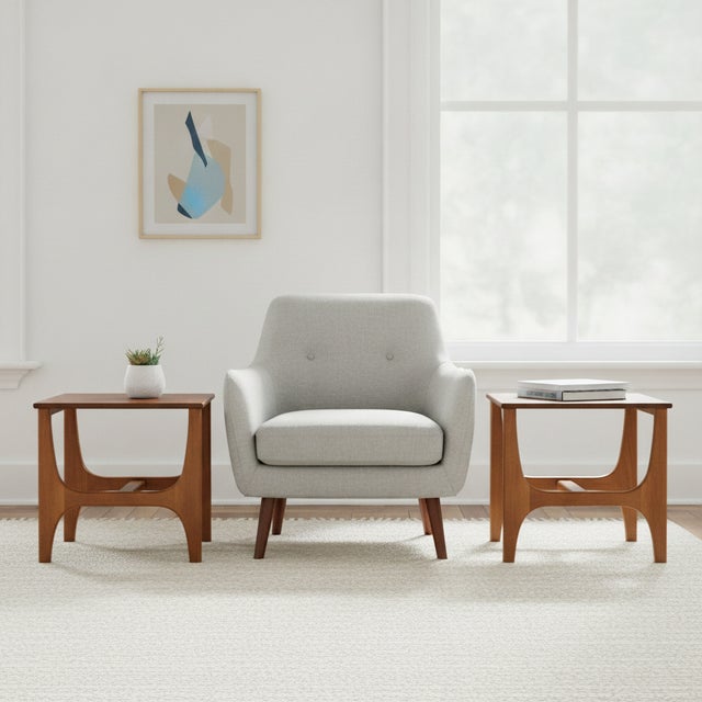 This pair of minimalist side tables oozing mid century design appeal. Whilst there are no attribution marks, the design is...