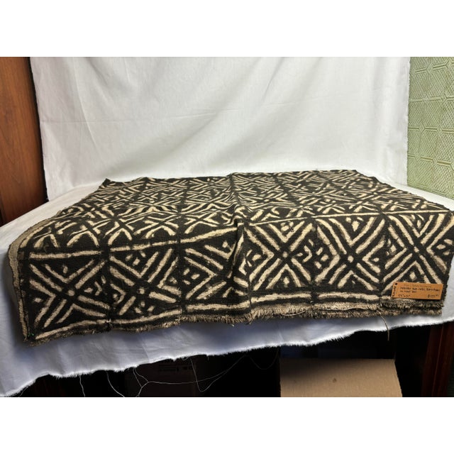 This earthy African Mud Cloth is perfect for bringing grounding energy to any space. The natural material is woven and...