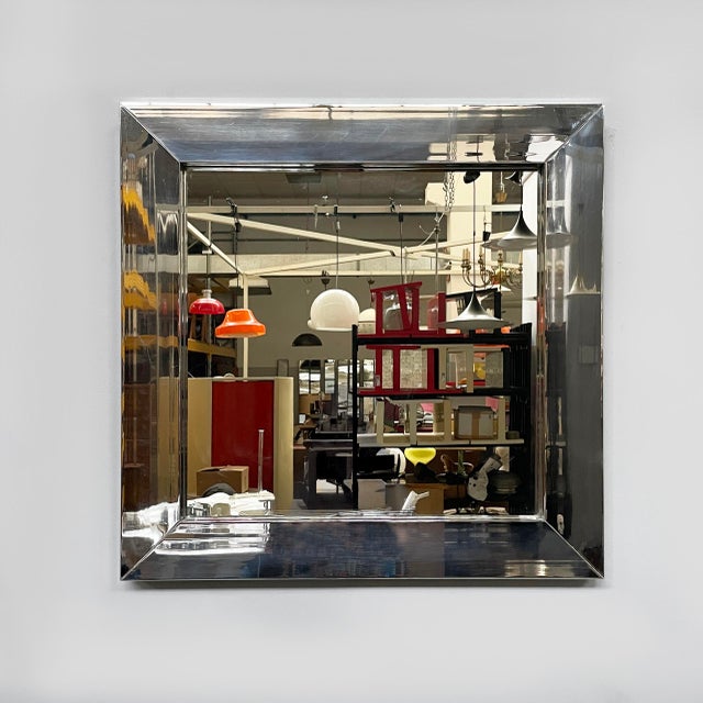 Italian modern square wall mirror in chrome metal, 1970s Square wall mirror with a thick, reflective chrome-plated metal...