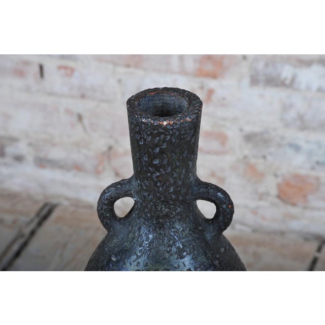 This elegant ceramic vase originates from 1920s Czechoslovakia and stylistically belongs to the Art Deco period. Its...