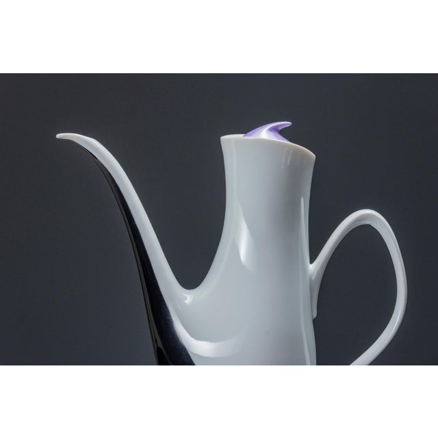 This porcelain coffee service was designed by Jaroslav Ježek in 1959 for the Loučky porcelain factory in Czechoslovakia....