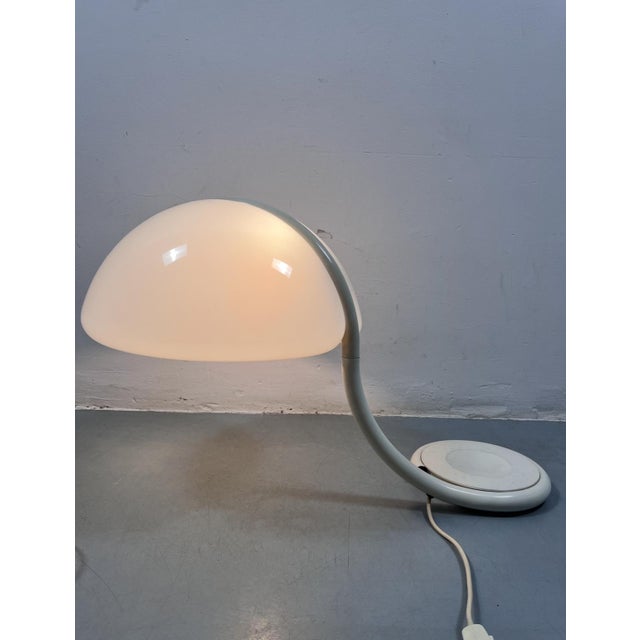 Model 599 Serpente Table Lamp by Elio Martinelli for Martinelli Luce, 1960s, in Very Good conditions. Designed 1960 to...