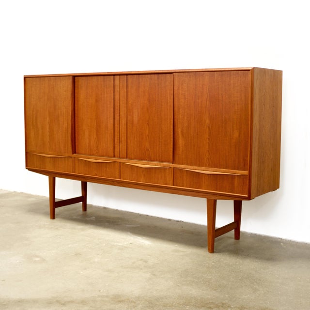 Dimensions: 77 1/4“ L x 17 3/8" D x 44 5/16" H Origin: Denmark Designer: E.W. Bach Manufacturer: Sejling Skabe Year: ca...