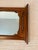 Pennsylvania House solid cherry wood hallway pier mirror from the late 20th century. This mirror has an architectural...