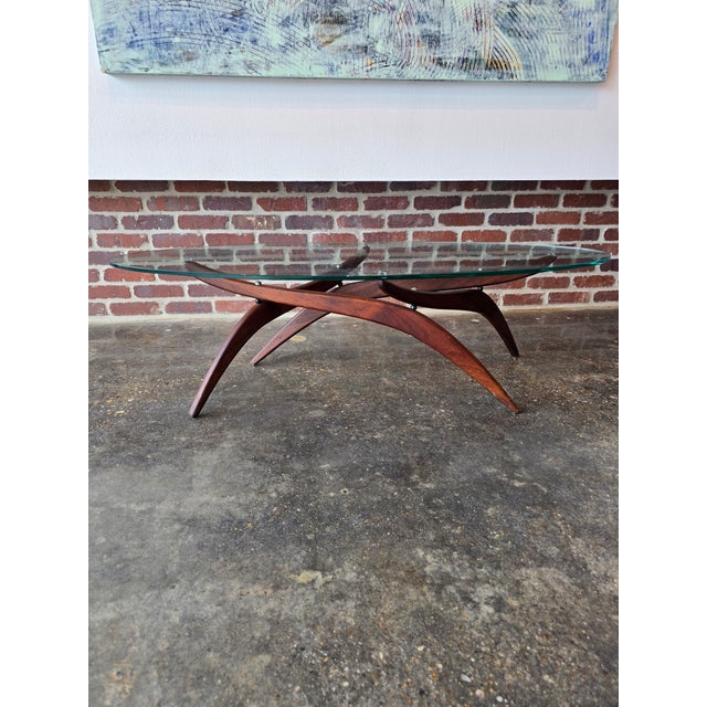 See our other listing for the matching end tables... Exquisite Forest Wilson sculpted walnut and glass coffee. Unmarked...