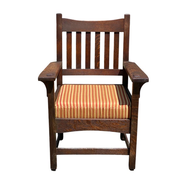 We are pleased to offer for sale this wonderful early 20th century Antique Arts & Crafts / Mission Oak armchair. The chair...