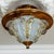French Art Deco ceiling light, circa 1930s. Elegant ceiling light featuring a molded frosted glass shade with floral...
