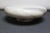 Postmodern faux-marble resin mushroom-form coffee table in off-white with grey veining (ca. 1980s, USA). Very fine,...