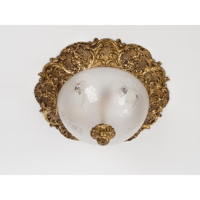 Elevate your space with this magnificent mid-20th-century Spanish flush mount ceiling light. Masterfully crafted in Spain...