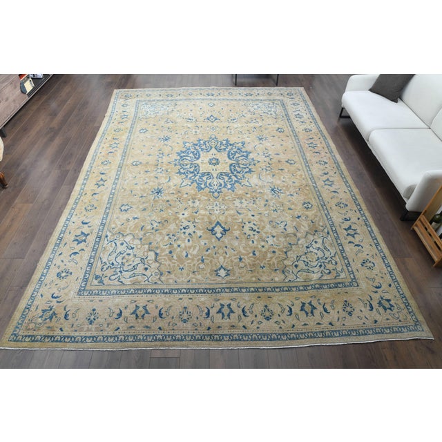 Vintage Persian Hand-Knotted area rug is a semi-antique vintage area rug. The '70s Eastern region of Anatolian's unique...