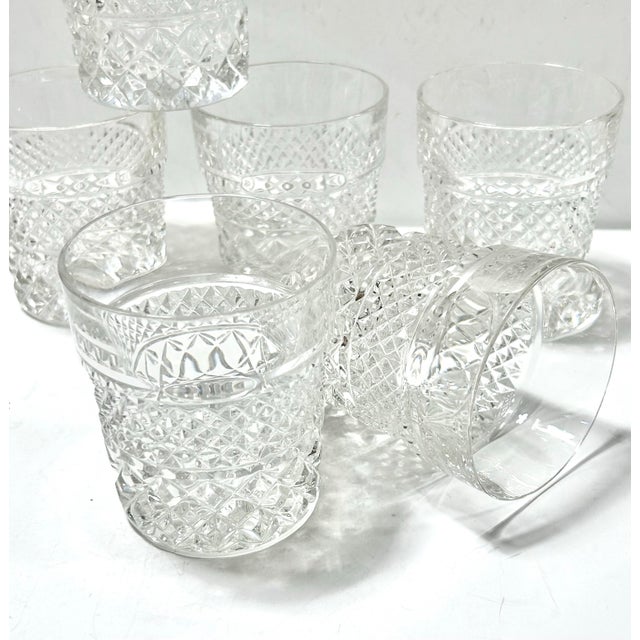 This set of six vintage cut crystal rocks glasses features a timeless diamond-cut pattern accented by a deeply faceted...