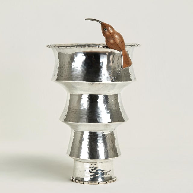 Mid century silver plate on hammered copper vessel handcrafted in an unusual art deco form featuring a stone clad humming...