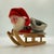 This charming mid-century German Erzgebirge Santa on a wooden sled is a classic example of Seiffen region folk art from...