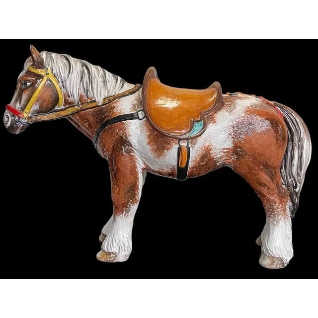 This is an amazing piece! It is a Hollywood Regency Era Italian terracotta horse figurine. It appears to be a horse , as...