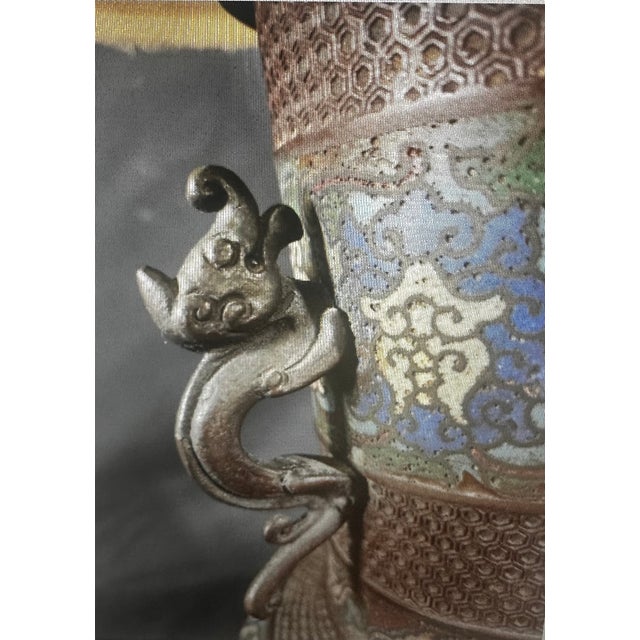 This lamp dates to the late 19th or early 20th century (Meiji Period 1868-1912) Japan, drawing inspiration from the...