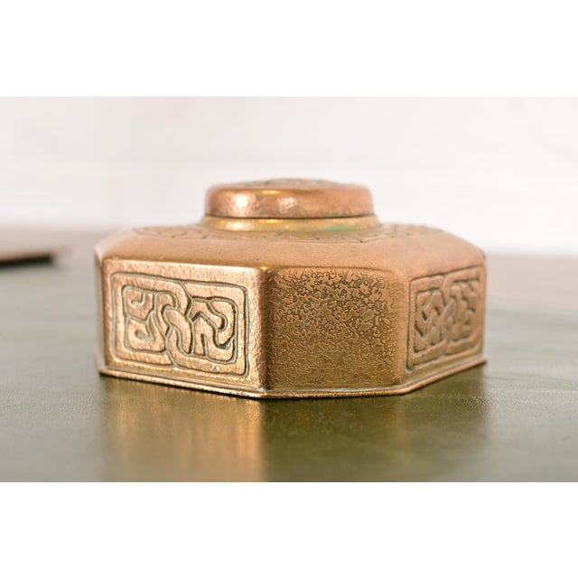 A gorgeous Arts & Crafts or Art Deco period "Zodiac" pattern gilt bronze inkwell By Tiffany Studios (signed to the...