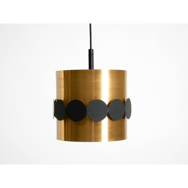 A beautiful, original 1960s space age pendant lamp by doria. it casts a stunningly beautiful light in any room - ideal for...