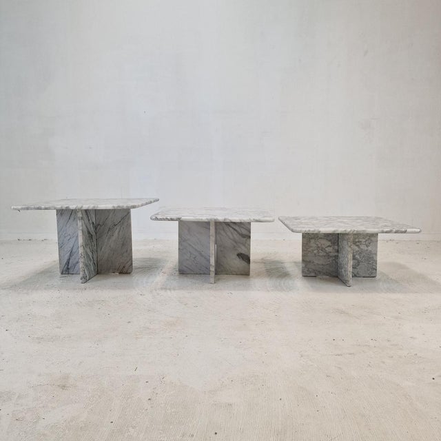 Stunning set of 3 Italian coffee or side tables, handcrafted out of Bianco Carrara Marble. They can be used inside or...