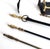 A five piece set of cast iron and brass fireplace tools and a rack to store them. The set has been heavily used and has...