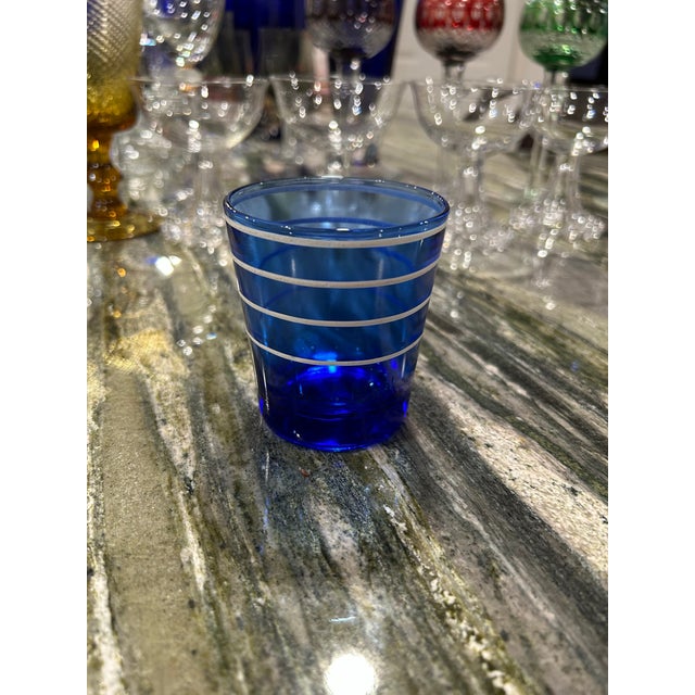 Set of seven cobalt blue vintage 1950’s low ball tumblers by Hazel Atlas. This set is a rare find!
