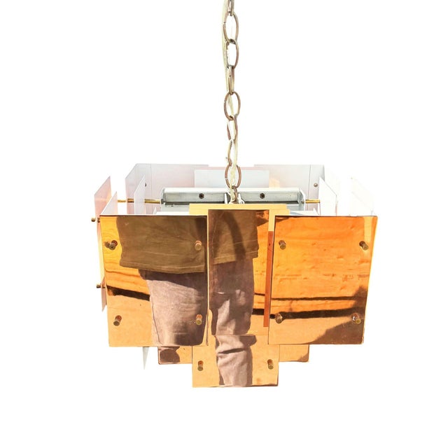 Impeccably refurbished floating panel "Cityscape" Brutalist Chandelier by designer Robert Sonneman. An architectural...