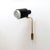 Elegant articulate plug-in wall light by Itsu, Finland, 1960s, black double-tier body with white detachable diffusor at...