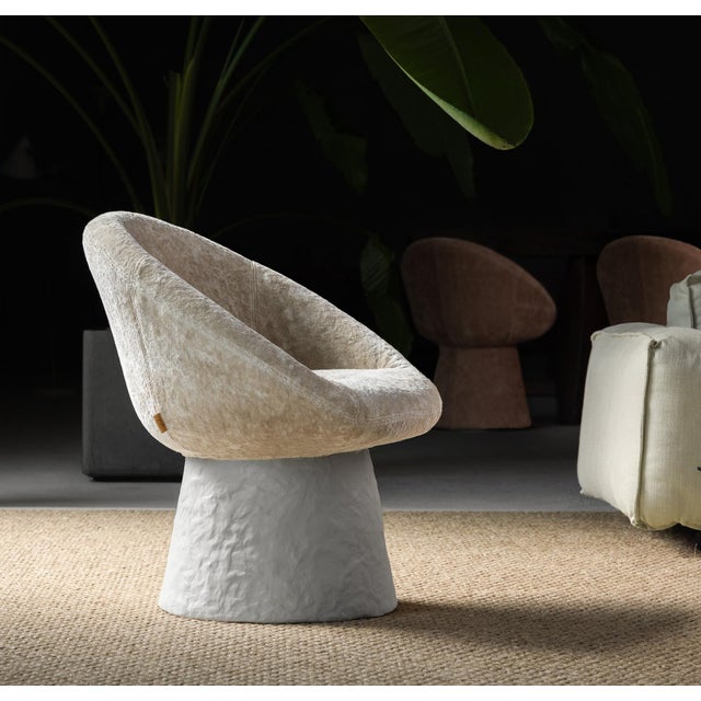 The Banet Lounge Chair combines effortless comfort with a striking presence. Its refined curves and luxurious upholstery...