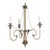 Curvilinear chandelier with gold painted metal finish featuring a verdigris floral motif.