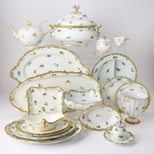 An exceptional and extensive antique Meissen porcelain dinner service, made in Germany in the 19th century by the renowned...