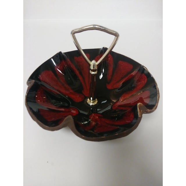 This 1960's Sequoia Ware, red and black glazed inside, brown wood design exterior and a silver handle nut and candy dish...