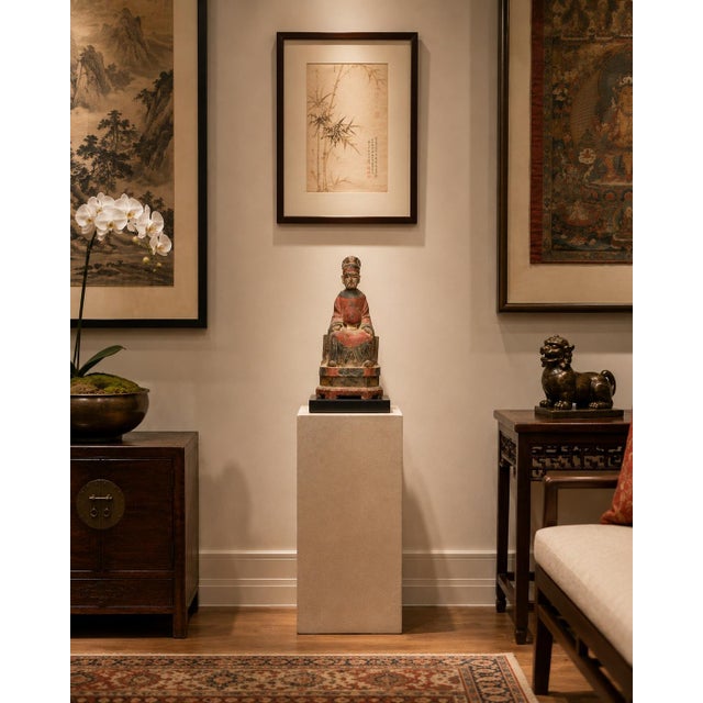 This remarkable 19th-century Chinese hand-carved wood statue depicts a seated Ming official/scholar in traditional robes...