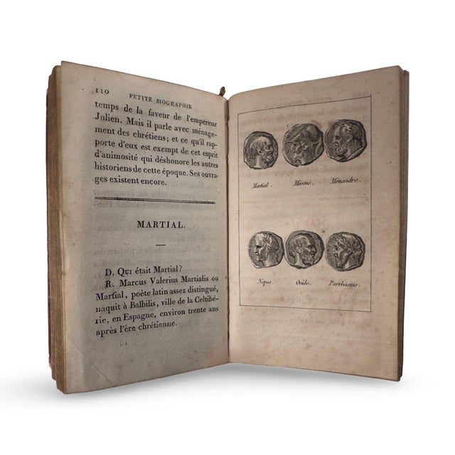 A deliciously timeworn French treasure, this antique mottled-calf volume feels like it has lived a dozen lives before...