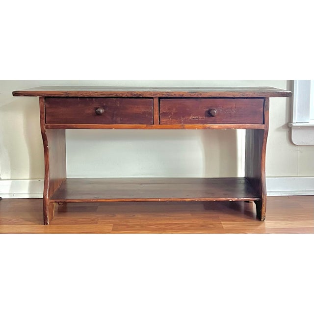 Great rustic farmhouse antique pine bench. Hard to find configuration with two hand dovetailed drawers and shelf below....