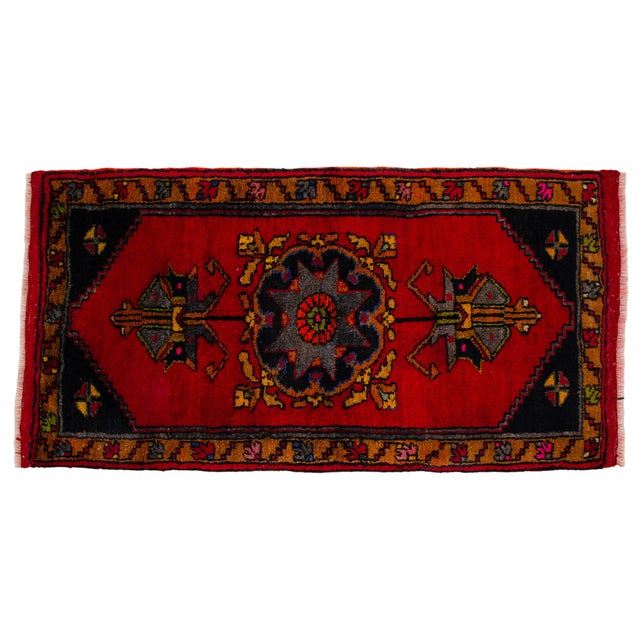 Elevate your interiors with this exceptional vintage Anatolian mat, featuring a striking geometric design that...