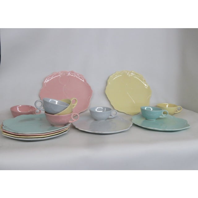 This gorgeous Set of 15 Tea Cups and Plates is made of ceramic. This delightful set was made in the U.S.A. by Taylor Smith...