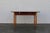 Beautiful antique farmhouse drop-leaf dining table dating to circa 1920s, crafted from wood and featuring a warm,...