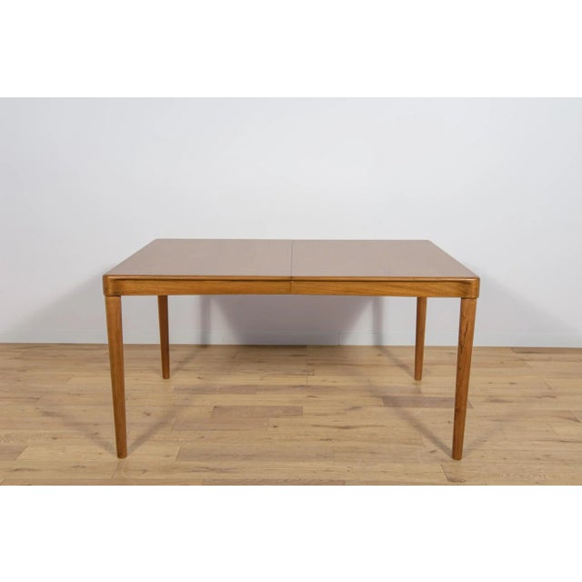 A unique dining table crafted from teak by Henry Walter Klein for the Danish manufacturer Bramin. This table,...