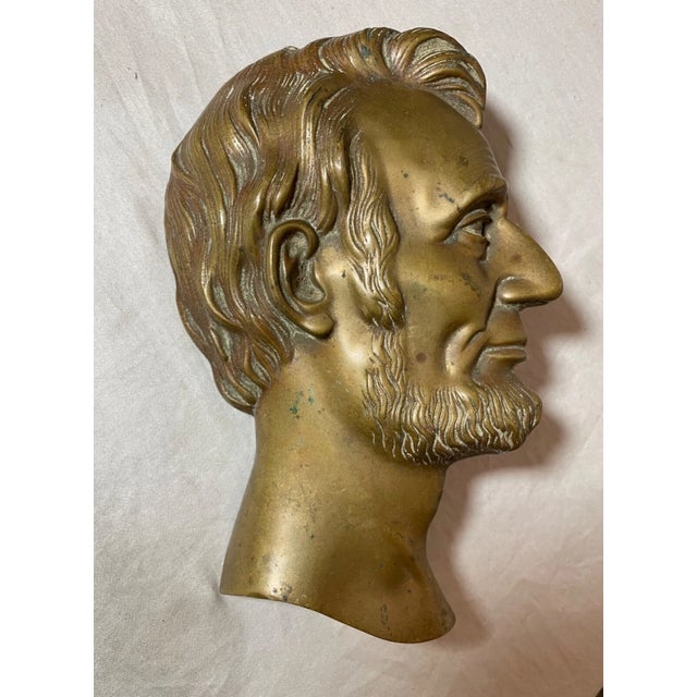 Up for sale is a nice quality antique bronze Abraham Lincoln wall plaque. It's cast out of thick gold gilded bronze, is a...