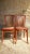 This pair of Art Nouveau chairs, made by Thonet in the early 20th century, is signed under the seat with a stamp and...