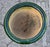 Add authentic Moroccan charm to your home or garden with this handcrafted pottery planter featuring a rich deep-green...