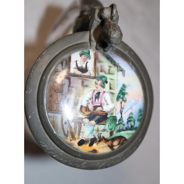 Up for sale is a nice quality antique 19th century lidded German beer stein. The pewter lid has a wonderful convexed...